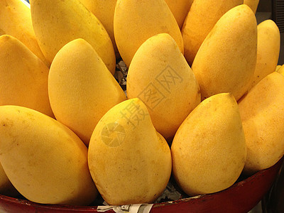 黄黄芒果甜点水果热带饮食背景图片