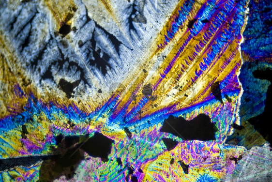 分极光中的烟尘颗粒和微晶晶体魔法化学结晶材料照片煤烟矿物微观水晶纹理图片
