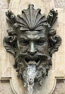 人类头喷泉 瑞士日内瓦装饰历史性历史男人雕像石头流动旅行城市建筑学图片