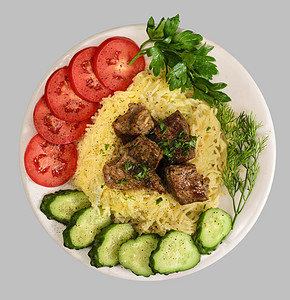 配有炖肉和蔬菜的热米机面条美食烹饪餐厅草药食物盘子牛肉餐饮图片