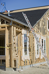 正在建造的新住房梯子房子建筑框架工地木头建筑学图片