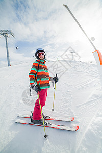 女孩在滑雪板上粉末自由头盔套装运动女性婴儿青年孩子们娱乐图片