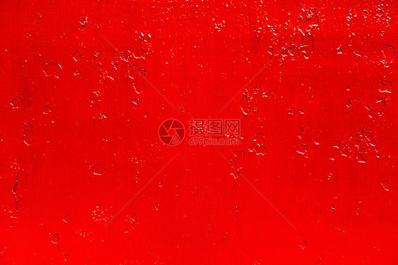 金属表面旧红色涂料的抽象背景表层图片
