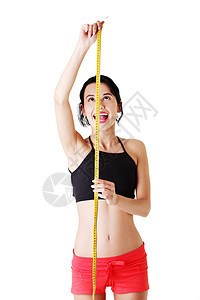 迷人的瘦瘦女人 有测量胶带腹部皮肤腰部身体女士节食数字橘皮磁带重量图片