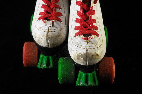 消耗的滚式滑板闲暇溜冰者蕾丝娱乐运动鞋带靴子滑冰旱冰车轮图片