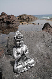 佛像雕像雕塑寺庙假期男人祷告沙漠岩石塑像沉思太阳图片