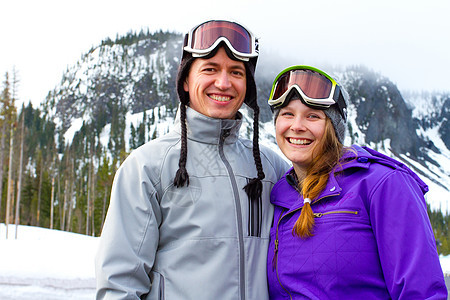 滑雪快乐夫妇极限白色运动单板夫妻夹克滑雪者男人滑雪板娱乐图片