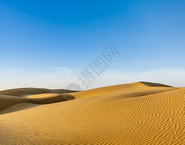 印度拉贾斯坦邦Thar沙漠的Dunes土地日落日光观光旅游沙漠旅行沙丘风景天空图片