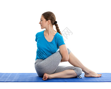 Yoga     单独进行瑜伽的年轻美女禅意女孩讲师训练白色运动脊柱成人姿势教练图片