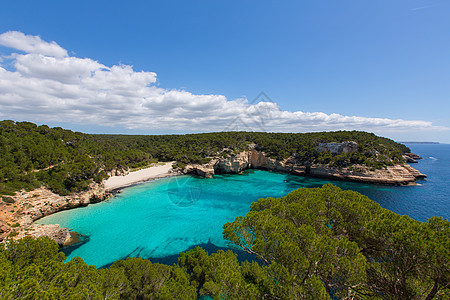 Balearics市的卡拉 米蒂雅内塔海洋岩石海滩海岸线假期树木地标海景旅行石头图片