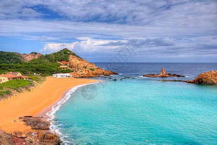 巴利阿里群岛Menorca的海滩场景海景海岸线石头天空波浪海洋海岸蓝色图片