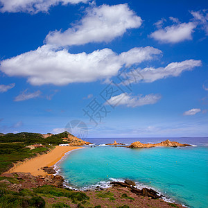 巴利阿里群岛Menorca的海岸线天空波浪海洋太阳石头蓝色海岸支撑场景图片