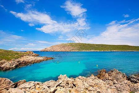 巴利阿里群岛Menorca的角斗篷海岸天空太阳海滩支撑场景岩石波浪海景旅行图片