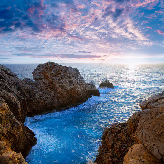 巴利阿里群岛的日落太阳晴天支撑天堂蓝色地标悬崖反射岩石旅行图片