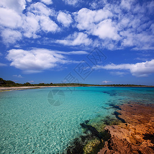 Ciutadella岛的海滩支撑石头旅行海洋天堂海岸线海岸太阳天空晴天图片