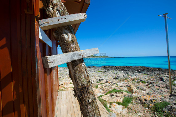 Ciutadella岛的海滩蓝色石头假期海景晴天支撑地标天堂波浪天空图片