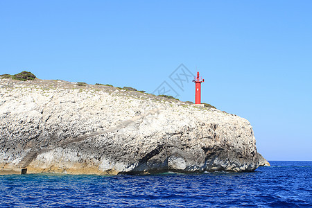 灯塔海滩地标海岸线旅行岩石红色港口建筑导航支撑图片