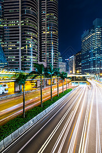 香港市夜间交通繁忙办公室商业城市金融景观摩天大楼企业建筑大楼踪迹图片