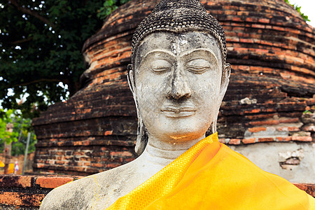 巨盛的古老佛佛崇拜雕像长袍祷告石头金子精神岩石佛教徒文化图片