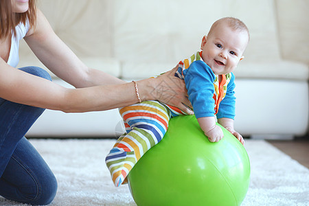 婴儿体操地毯闲暇童年运动活动静物母性女士训练房间图片