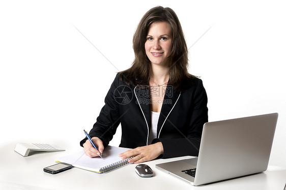 商业妇女微笑办公室老板人士商务成人工人工作桌子女性计算器图片
