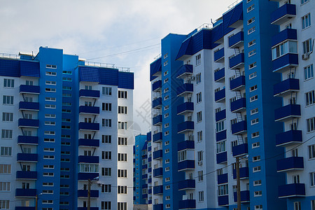 公寓区旅行建筑蓝色城市住房玻璃天空投资房子窗户图片