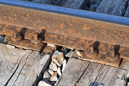 与旧铁路铁轨螺丝钉的详情氧化木头水泥金属火车螺丝图片
