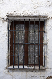 西班牙安达卢西亚城墙上的古窗图片