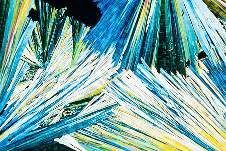 极化光下的铀或碳氨化物晶体实验实验室光谱照片显微镜科学极化显微水晶宏观图片