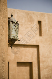 在阿联酋迪拜Al Ain宫博物馆Al Ain宫博物馆的墙上特写孔灯图片