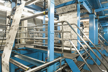 特写报纸的制作和印刷过程在报刊出版和印刷过程中职场经济机械水平制造业生产命令脚步造纸工厂图片
