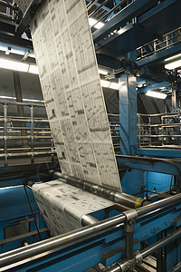 特写报纸的制作和印刷过程在报刊出版和印刷过程中命令职场制造业仓库栏杆商业工业造纸打印机械图片
