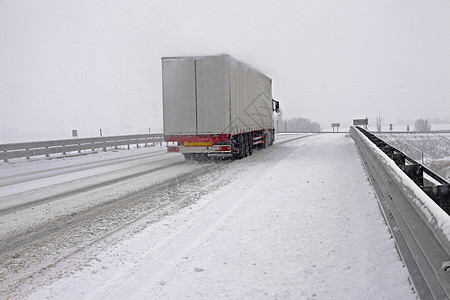 雪地高速公路商业国家货物运动驾驶后勤通勤者主路货车运输图片