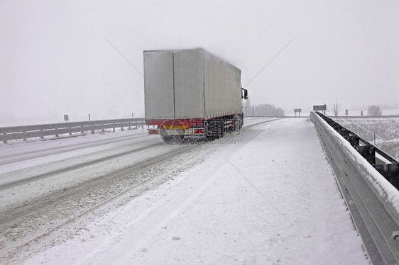 雪地高速公路商业国家货物运动驾驶后勤通勤者主路货车运输图片