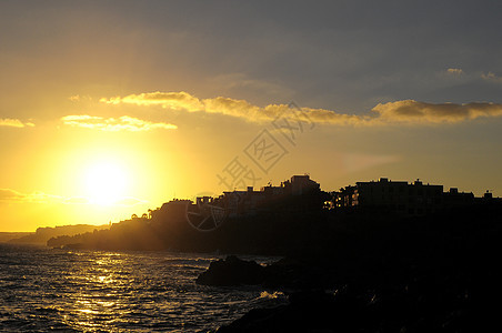 大西洋上空的日落支撑日出天空地平线海洋橙子风景海岸海岸线太阳图片