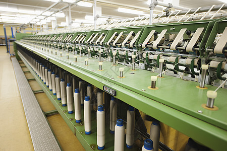 特写旋转工厂的机械部分设备部件命令组织工业服装材料机器生产纺织品绿色制造业图片