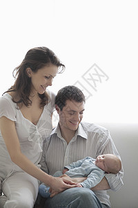 新生儿母亲和父亲及新生儿孕产儿子家庭孩子身份男孩女性长发宝贝男子图片
