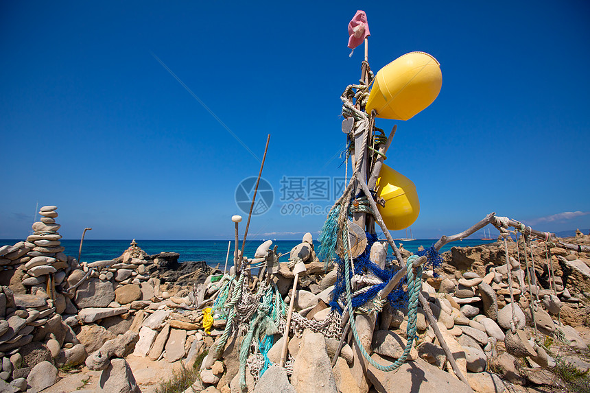 佛罗门特拉伊列提斯海滩海岸的石块旅行海滩假期海景小岛热带蓝色地标海岸线石头图片