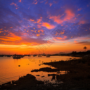 伊比扎埃斯韦德拉的伊斯坦德和平日落橙子支撑海滩旅游天空太阳血管海岸旅行假期图片