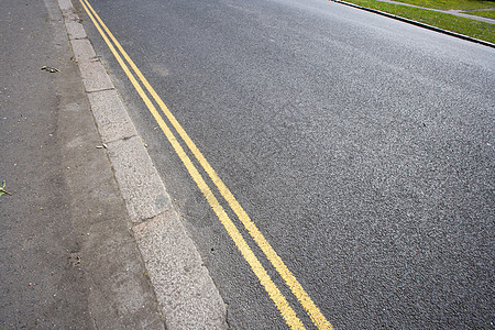 伦敦街上的双黄双线路线英语道路文化标记交通路面图片