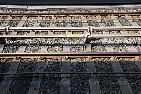 特写铁路轨迹横线棕色旅行曲目阴影背景图片
