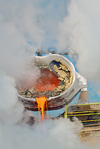 热钢灌注炼铁辉光技术矿渣工厂蒸汽钢厂讽刺铸件火焰图片