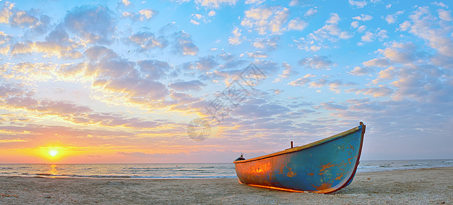 渔船和日出旅游支撑尾巴海岸旅行假期太阳天堂晴天蓝色图片