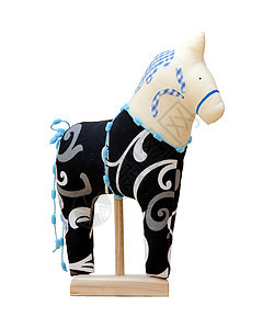手制柔软的玩具马 用黑色和蓝色隔离在斯坦材料纪念品缝纫编织包装线程礼物木头动物纺织品图片
