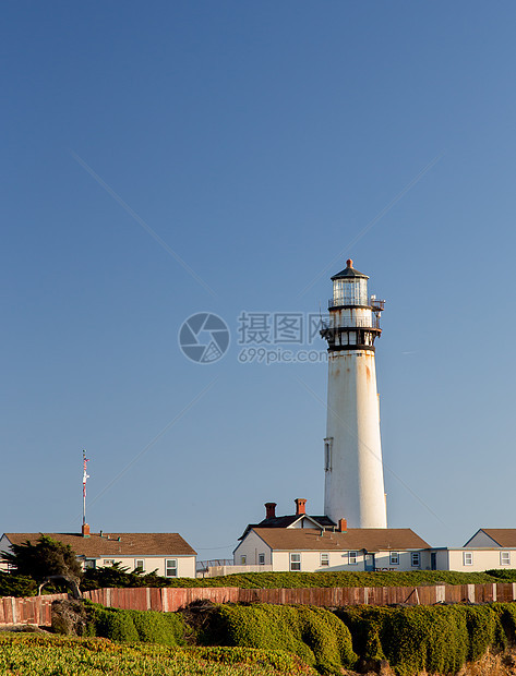 鸽点灯塔支撑导航历史性旅游海岸线蓝色悬崖旅行海景海岸图片