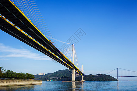 香港的停机桥通道爬坡运输街道海岸天际地标天空青马海洋图片