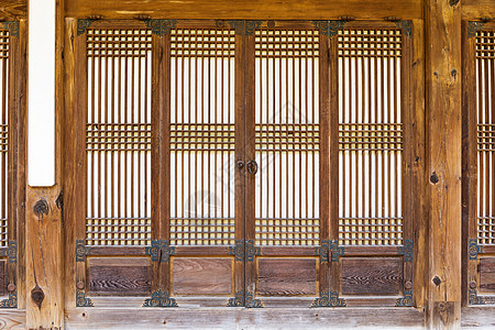 传统木制门戒指圆圈门把手入口棕色金属古董宗教建筑学木头图片
