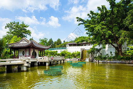 传统中华馆池塘寺庙房子天空植物石头建筑花园入口蓝色图片