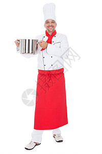 英俊厨师的肖像微笑职员白色服务食物美食烹饪男人厨房帽子图片