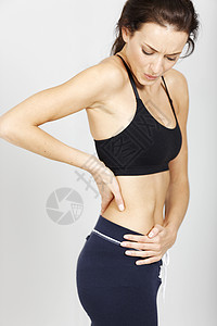 身体健康的妇女肩膀痛苦调色训练运动健身房身体疼痛女性女孩图片